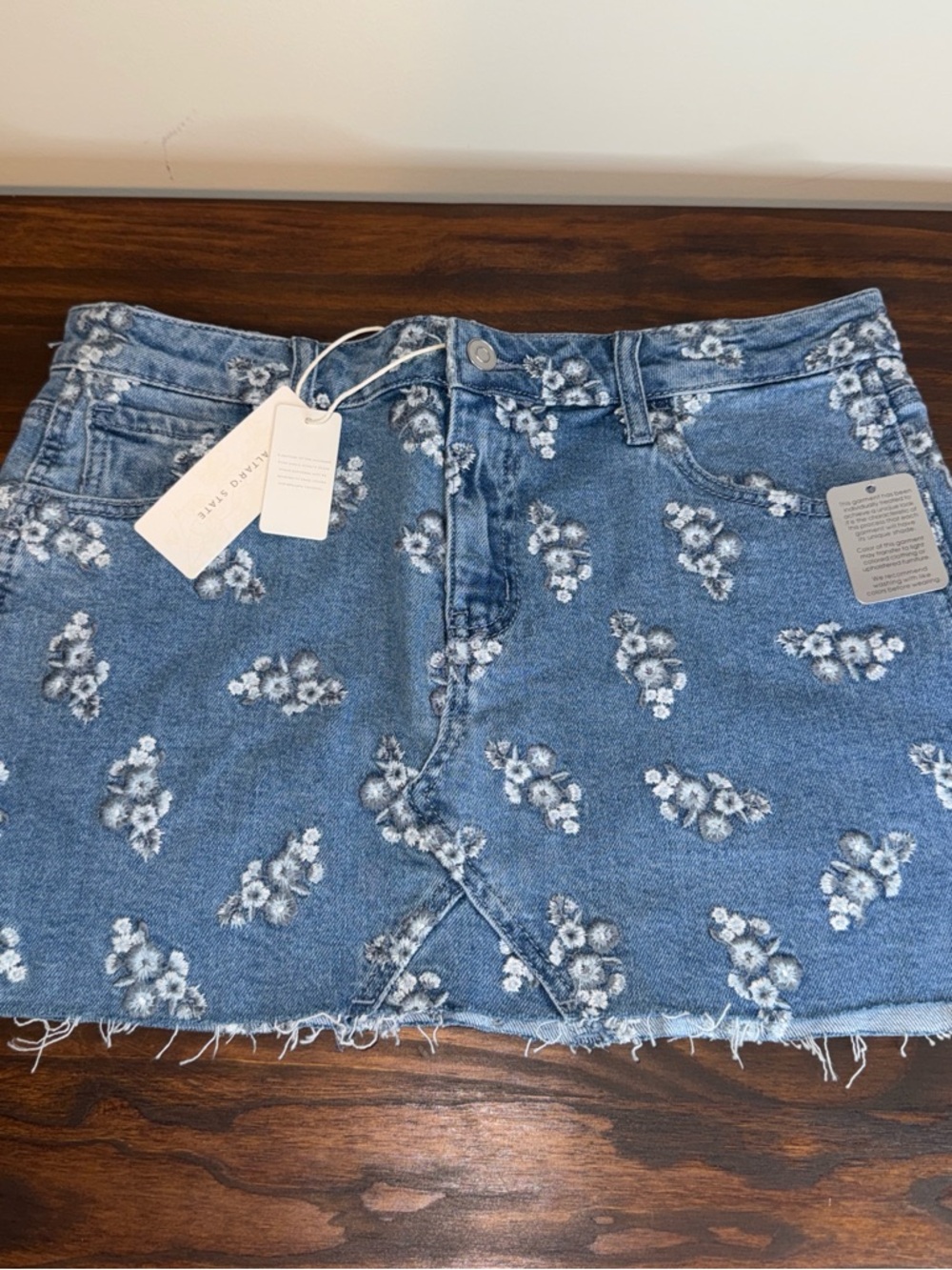 Altar'd State Blue Denim Mini Skirt with White Floral Embroidery